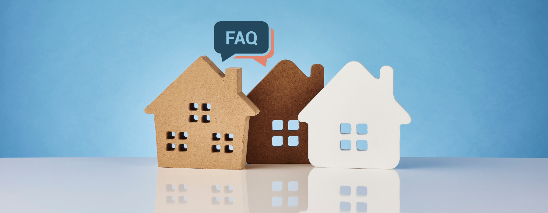 Three colorful house icons alongside an FAQ graphic representing frequently asked questions for Sanctuary at Powell Place apartments in Pittsboro, NC.