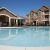 View of the pool area and it's reclining chairs 